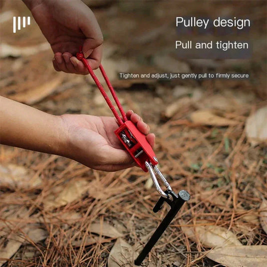 Hand using red pulley rope tightener for camping gear, outdoor auto tool by clarioy