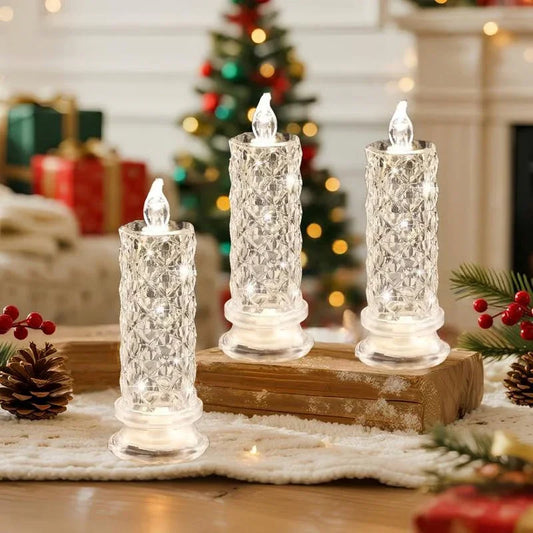 Crystal LED candles on holiday decor table with pinecones and Christmas tree, clarioy homeware.