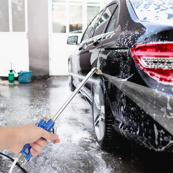 Hand using car washer spray nozzle cleaning black car with soap, premium auto tools from clarioy