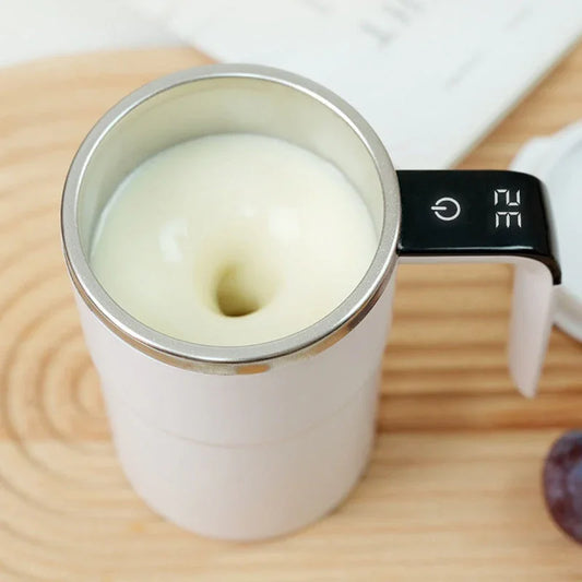 Electric milk frother with digital display in action, premium homeware from clarioy