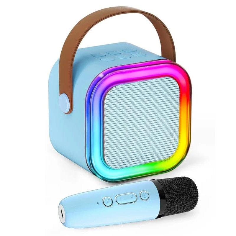 Blue portable Bluetooth speaker with rainbow LED frame, brown handle, and matching wireless microphone