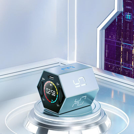 Futuristic digital clock with LED display on a metallic platform, modern homeware from clarioy.