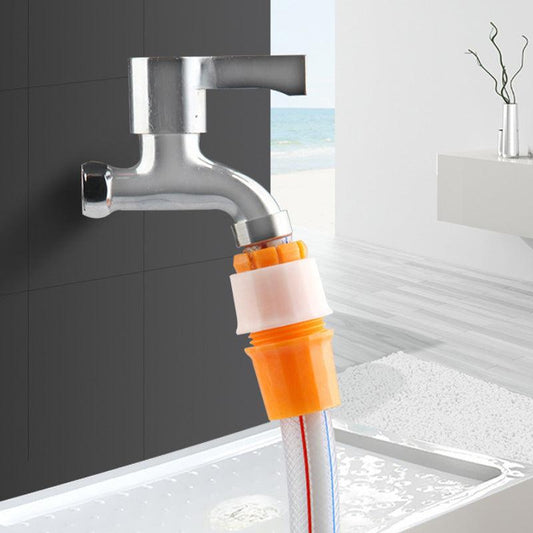 Chrome faucet with orange hose adapter connected, modern bathroom setting, clarioy auto tools