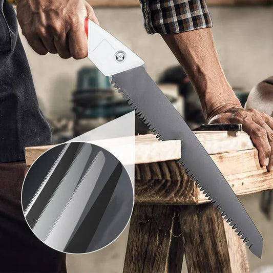 Person using a clarioy premium hand saw on wood, close-up of sharp saw blades, workshop setting