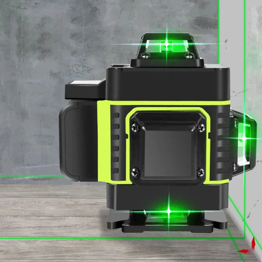 Green laser level tool on wood floor, concrete wall background, auto tools at clarioy