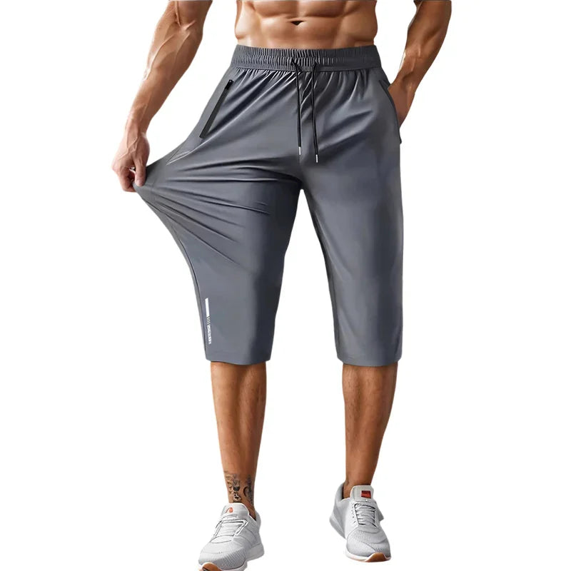 ๐ฉณ40% OFF NOW! ๐ Men's Quick-Dry Sports Capri Pants โ Stretchy & Breathable with Secure Zipper Pockets โ Elastic Waist & Versatile Fit ๐งโโ๏ธ