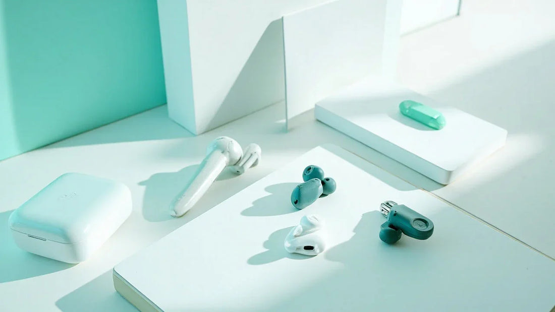 modern tabletop with small tools and electronics in bright clean lighting