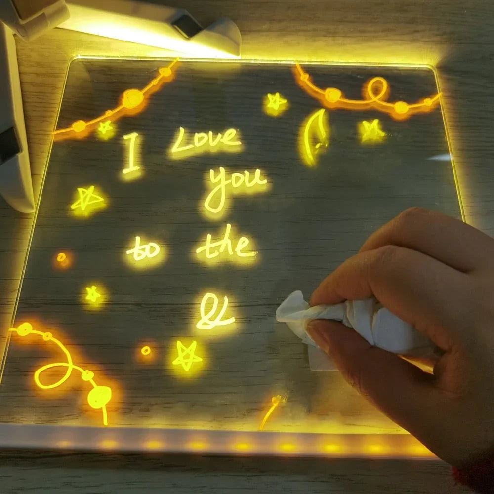 Hand wiping LED message board with 'I love you to the moon' written, clarioy home electronics