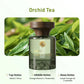 Orchid Tea scented fragrance bottle with green tea leaves background, top middle and base notes listed