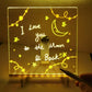 LED message board with 'I love you to the moon & back' written, glowing yellow, clarioy homeware
