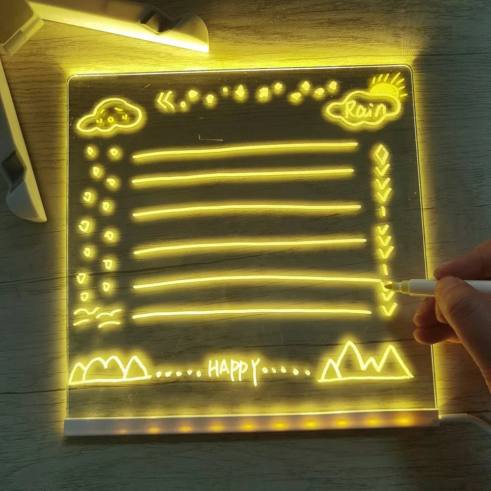 LED acrylic message board with yellow light, handwritten doodle designs, used as homeware stationery from clarioy.