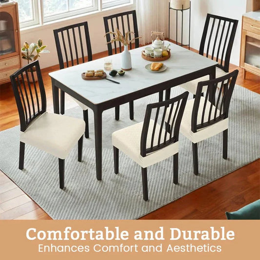 Modern dining room set with six dark wood chairs, white seat covers, marble table on rug, bright homeware decor