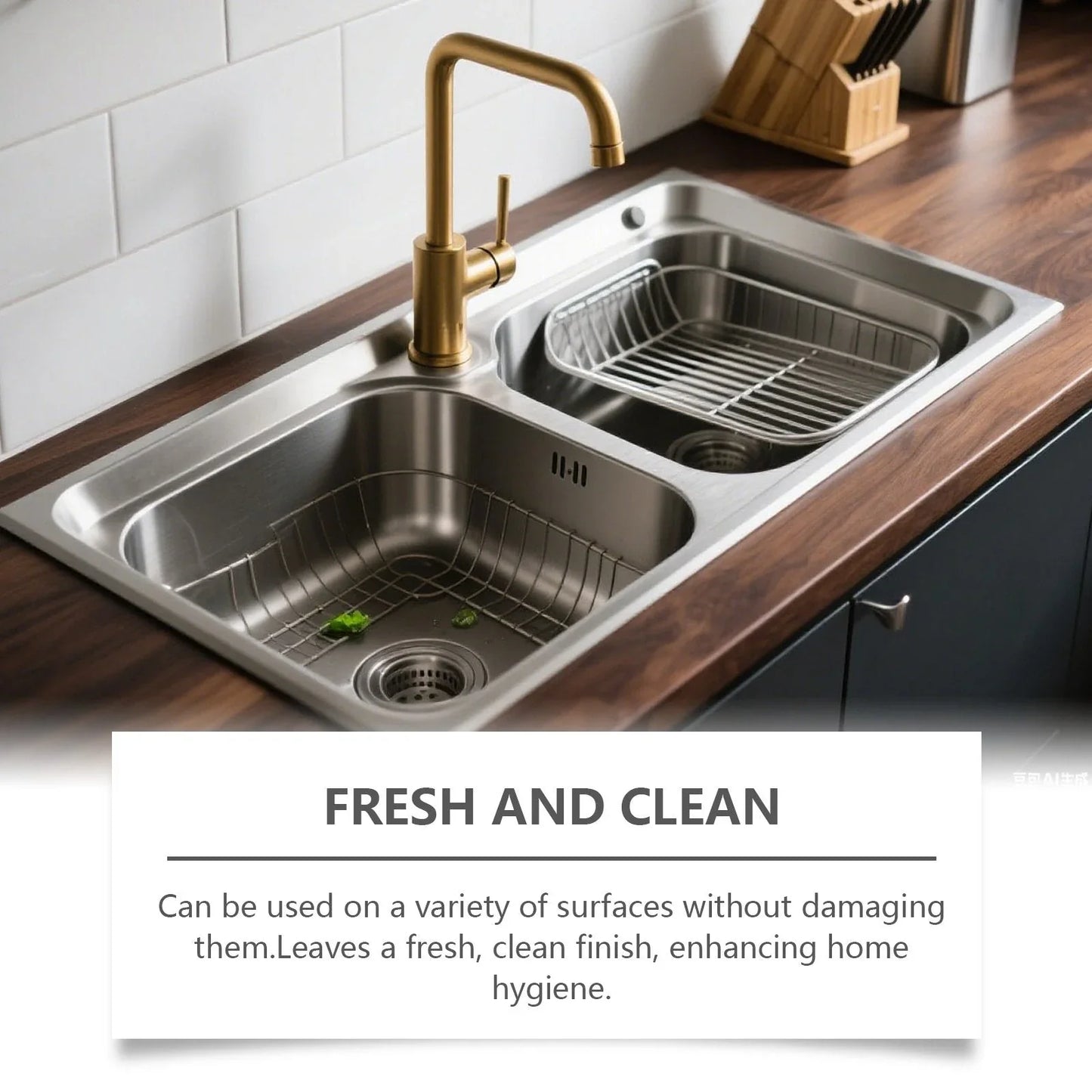 Stainless steel kitchen sink with gold faucet on wood countertop, clean and modern homeware.