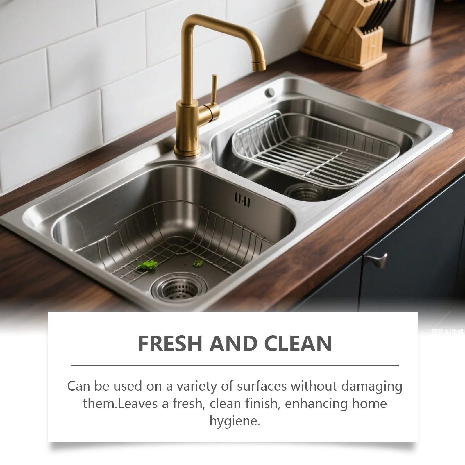 Stainless steel kitchen sink with gold faucet on wood countertop, clean and modern homeware.