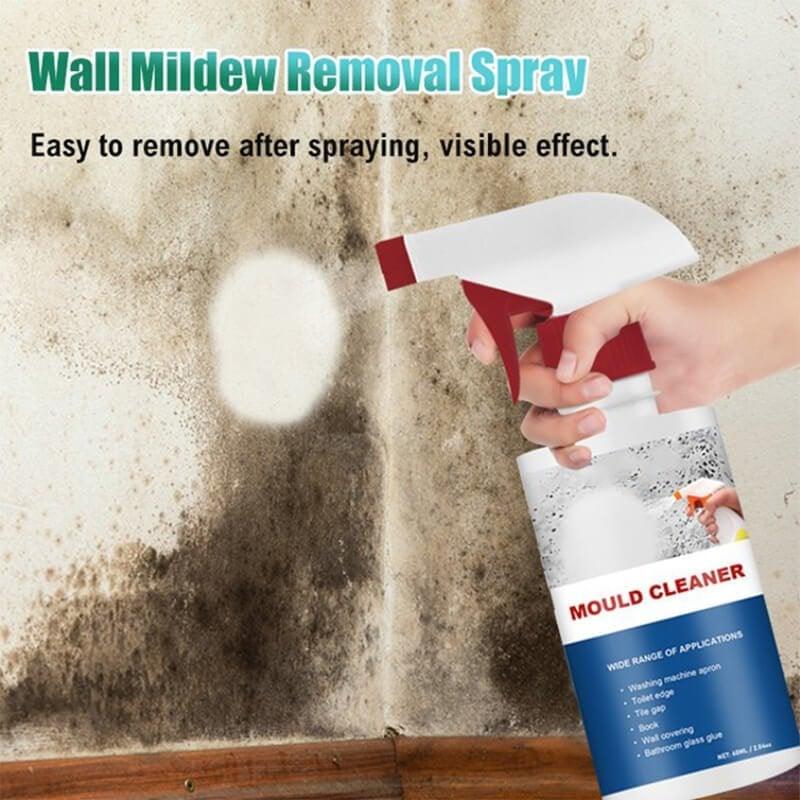Hand spraying mould cleaner on wall with heavy mildew, visible cleaning effect, clarioy homeware