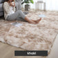 Woman sitting on khaki fluffy rug in modern living room, homeware decor from clarioy