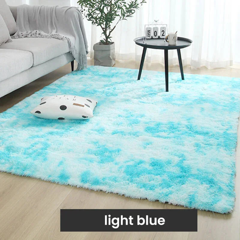 Light blue fluffy rug in modern living room with sofa, table, cushion, and plant from clarioy.
