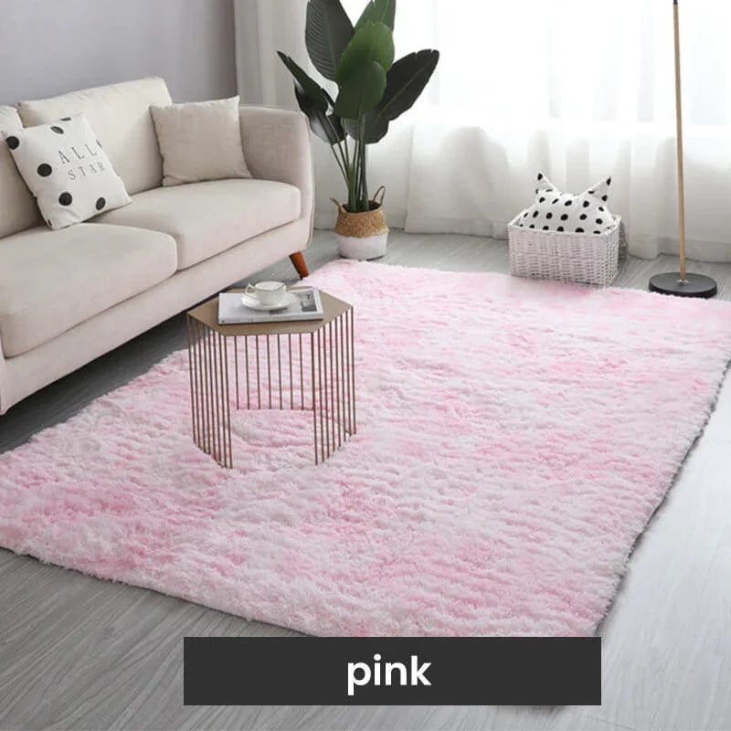 Modern living room with a pink fluffy rug, cream sofa, and gold accent table, clarioy homeware