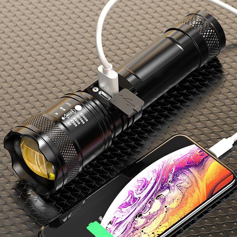 Rechargeable LED flashlight charging smartphone via USB on textured surface, Clarioy tech tool