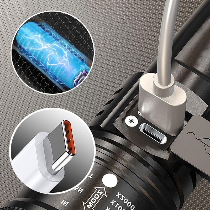Closeup of rechargeable flashlight with USB-C charging port, cable, and battery visualization.