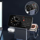 Wireless charging stand on desk holding smartphone with clock and calendar display, Apple Watch, and AirPods. Premium electronics from clarioy.