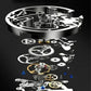 Exploded view of a watch movement with metal gears and components on black background