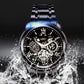 Luxury black skeleton automatic watch with visible gears, metal band, and water splash effect