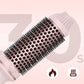 Clarioy pink heated hair styling brush with ceramic bristles on light background