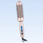 Rose gold electric hair styling brush with LED display on light blue background, clarioy homeware