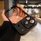 Hand holding black iPhone case with camera lens protection, clarioy mobile accessories