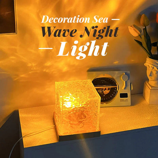 Sea wave night light lamp with textured glass, warm glow on table next to radio and flowers
