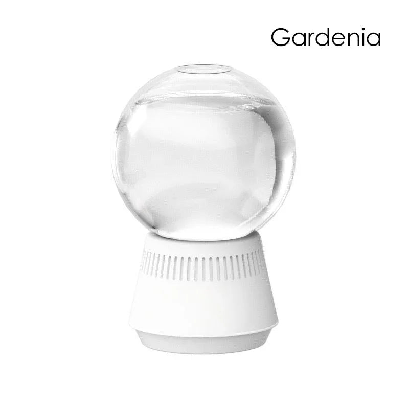 Clarioy Gardenia air humidifier with clear glass globe and white base, modern homeware
