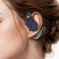 Woman wearing a black wireless Bluetooth headset from clarioy