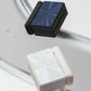 Two compact, foldable wireless headset cases in black and white with metallic covers, clarioy home electronics.