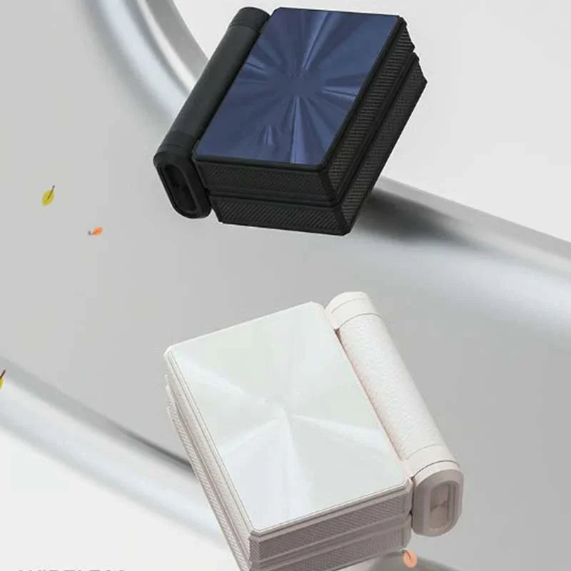 Two compact, foldable wireless headset cases in black and white with metallic covers, clarioy home electronics.