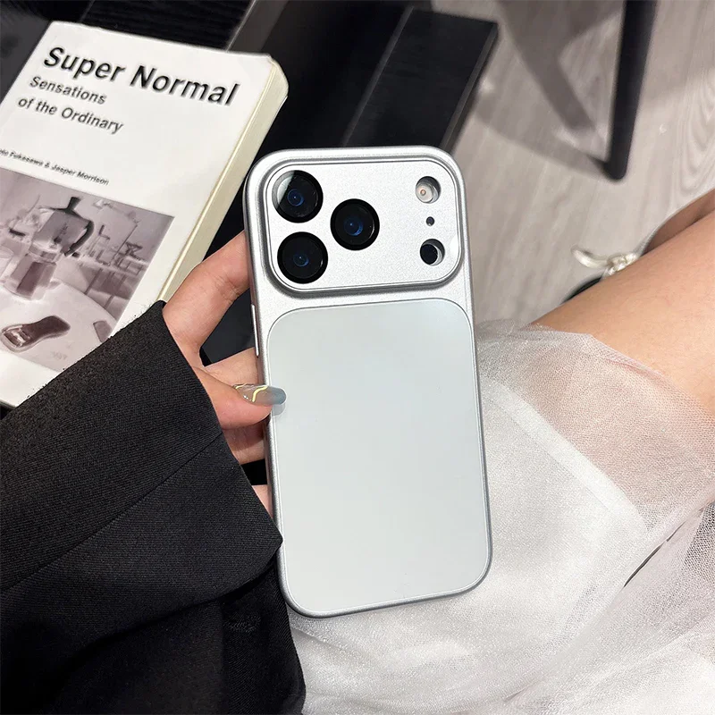Hand holding silver iPhone with a sleek protective case, modern design by clarioy