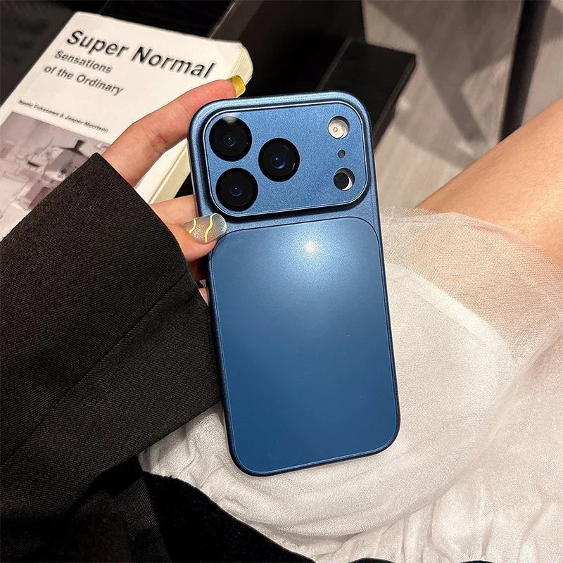 Blue iPhone case with camera protection cover held in hand, premium homeware accessory from clarioy