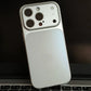 Silver iPhone case with large camera cutouts on a laptop keyboard, clarioy electronics