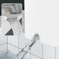 Modern white homeware water dispenser pouring into tiled sink, close-up detail, clarioy