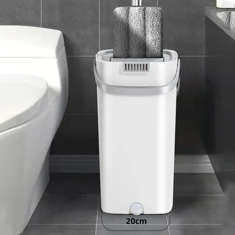 Slim white mop bucket with mop, 20cm wide, beside toilet in modern bathroom, clarioy homeware