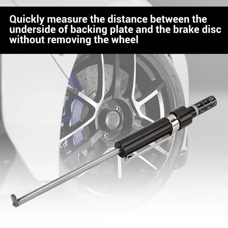Premium auto tool measuring brake disc clearance near a car wheel, available at clarioy.