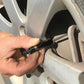 Hand using tire tread depth gauge on car wheel rim, premium auto tool from clarioy.