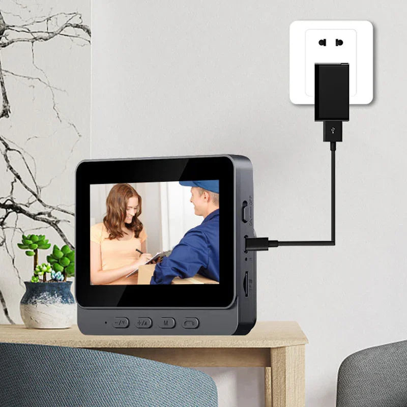 Video door phone monitor charging on table, showing delivery scene, modern homeware at clarioy