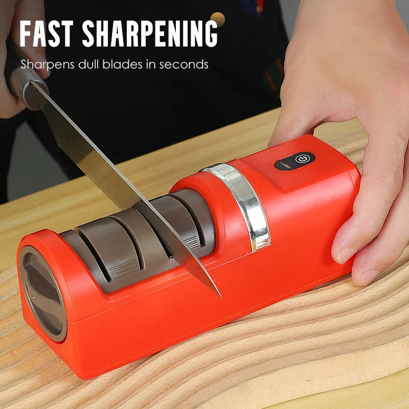 Red electric knife sharpener sharpening blade on wooden surface, premium auto tool from clarioy
