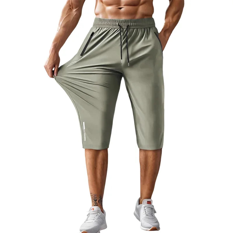 🩳40% OFF NOW! 🏃 Men's Quick-Dry Sports Capri Pants – Stretchy & Breathable with Secure Zipper Pockets – Elastic Waist & Versatile Fit 🧘‍♂️